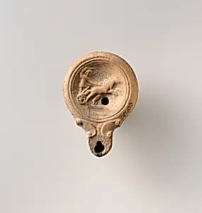 Terracotta oil lamp by Unknown Artist