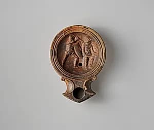 Terracotta oil lamp by Unknown Artist