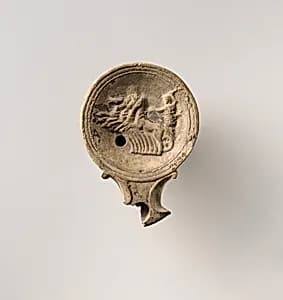 Terracotta oil lamp by Unknown Artist