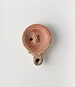 Terracotta oil lamp by Unknown Artist