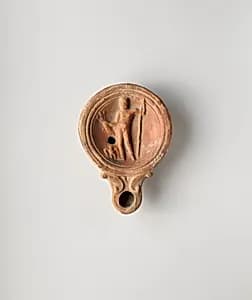 Terracotta oil lamp by Unknown Artist