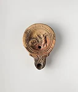 Terracotta oil lamp by Unknown Artist