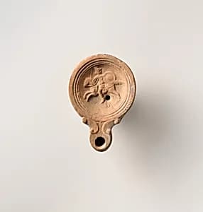 Terracotta oil lamp by Unknown Artist