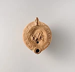 Terracotta oil lamp by Unknown Artist
