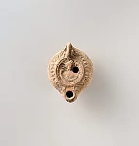 Terracotta oil lamp by Unknown Artist