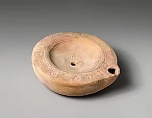 Terracotta oil lamp by Unknown Artist