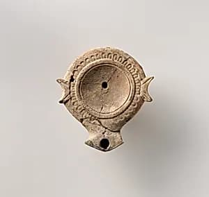 Terracotta oil lamp by Unknown Artist