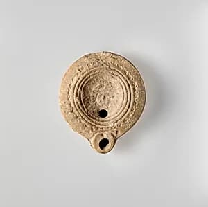 Terracotta oil lamp by Unknown Artist