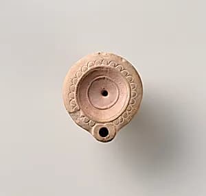 Terracotta oil lamp by Unknown Artist