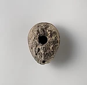 Terracotta oil lamp by Unknown Artist