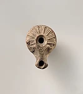 Terracotta oil lamp by Unknown Artist