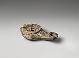 Terracotta oil lamp by Unknown Artist
