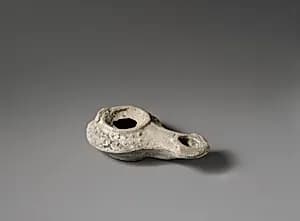 Terracotta oil lamp by Unknown Artist