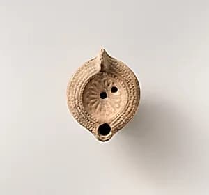 Terracotta oil lamp by Unknown Artist