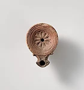 Terracotta oil lamp by Unknown Artist