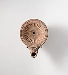 Terracotta oil lamp by Unknown Artist