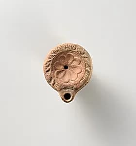 Terracotta oil lamp by Unknown Artist
