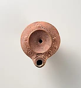 Terracotta oil lamp by Unknown Artist