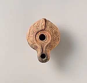 Terracotta oil lamp by Unknown Artist