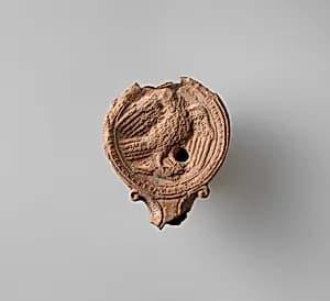 Terracotta oil lamp by Unknown Artist