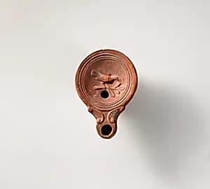 Terracotta oil lamp by Unknown Artist
