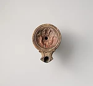 Terracotta oil lamp by Unknown Artist