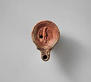 Terracotta oil lamp by Unknown Artist