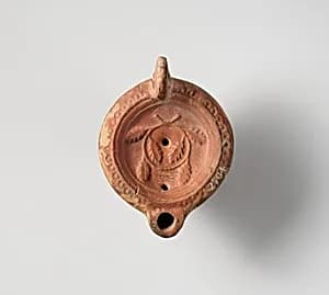 Terracotta oil lamp by Unknown Artist