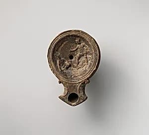 Terracotta oil lamp by Unknown Artist