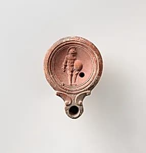 Terracotta oil lamp by Unknown Artist