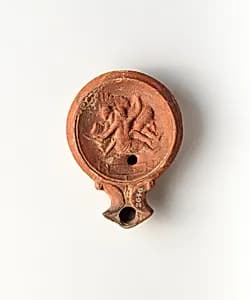 Terracotta oil lamp by Unknown Artist