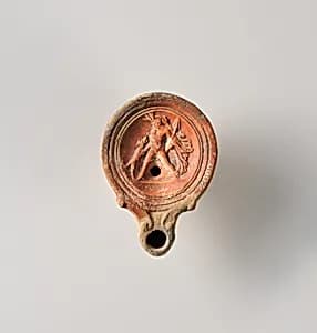 Terracotta oil lamp by Unknown Artist