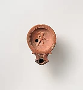 Terracotta oil lamp by Unknown Artist