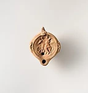 Terracotta oil lamp by Unknown Artist