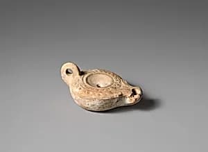 Terracotta oil lamp by Unknown Artist