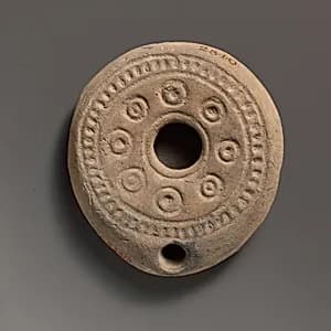 Terracotta oil lamp by Unknown Artist