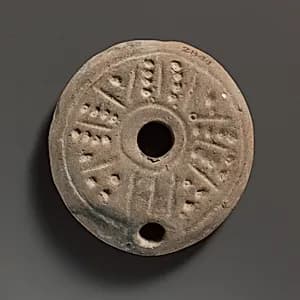 Terracotta oil lamp by Unknown Artist
