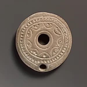 Terracotta oil lamp by Unknown Artist