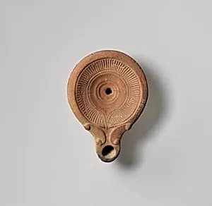Terracotta oil lamp by Unknown Artist