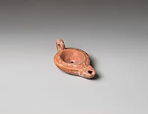 Terracotta oil lamp by Unknown Artist