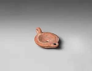Terracotta oil lamp by Unknown Artist
