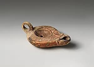 Terracotta oil lamp by Unknown Artist