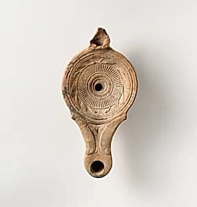 Terracotta oil lamp by Unknown Artist