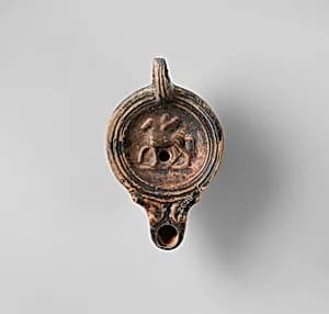 Terracotta oil lamp by Unknown Artist