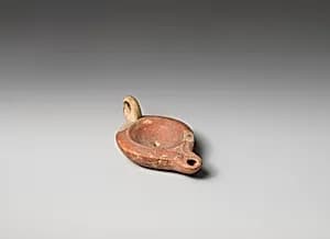 Terracotta oil lamp by Unknown Artist