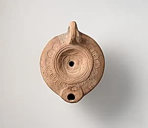 Terracotta oil lamp by Unknown Artist