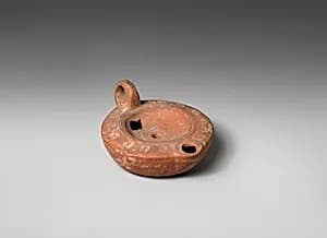 Terracotta oil lamp by Unknown Artist