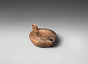 Terracotta oil lamp by Unknown Artist