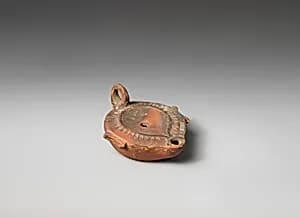 Terracotta oil lamp by Unknown Artist