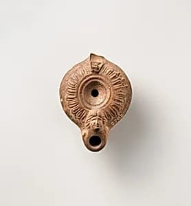 Terracotta oil lamp by Unknown Artist